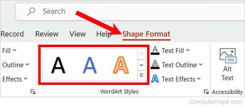 Adding WordArt to a text box in a Microsoft PowerPoint slide.