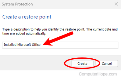 Naming and creating a restore point in Windows 11.