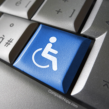 Blue accessibility keyboard key with a white wheelchair.