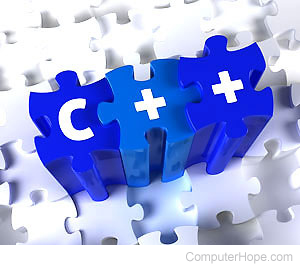 C++ characters printed on three-dimensional puzzle pieces.