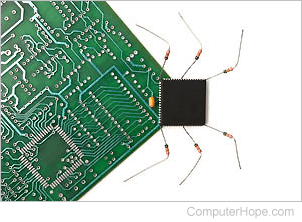 Robotic bug on a circuit board.
