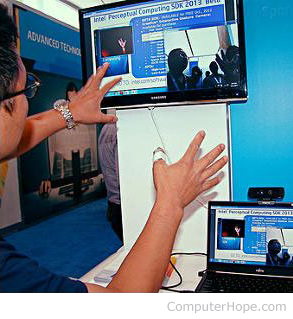Man giving gesture input to a computer.