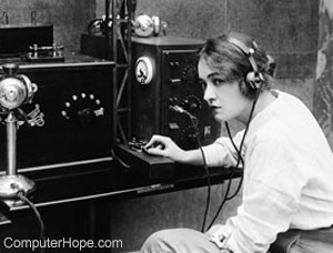 Woman using a telegraph machine
