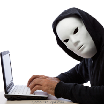 Anonymous individual using a laptop.