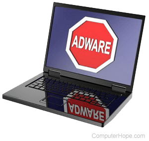 Adware warning shown on a laptop screen.