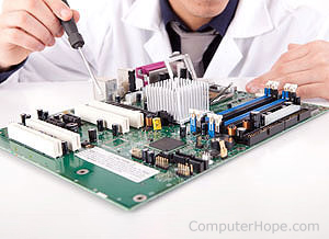 Person working on a motherboard