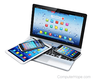 Laptop with a tablet and two smartphones sitting on the keyboard.