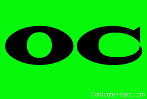 OC in black lettering on green background.