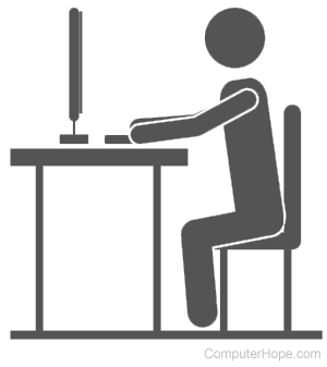 Illustrated person sitting at a desk, using a computer.