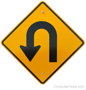 U-turn symbol on an orange sign.